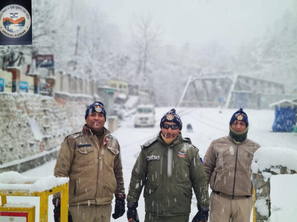 police on duty at Hanuman chatti during extreme weather conditions
